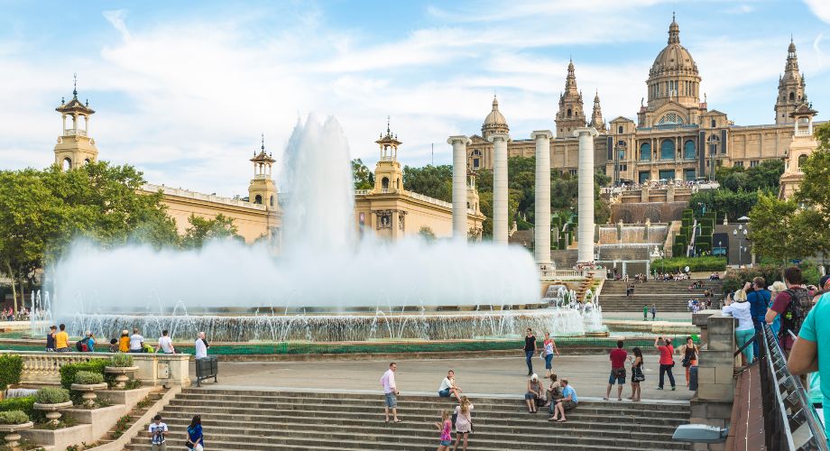 People standing by the Montjuic Magic Fountain 