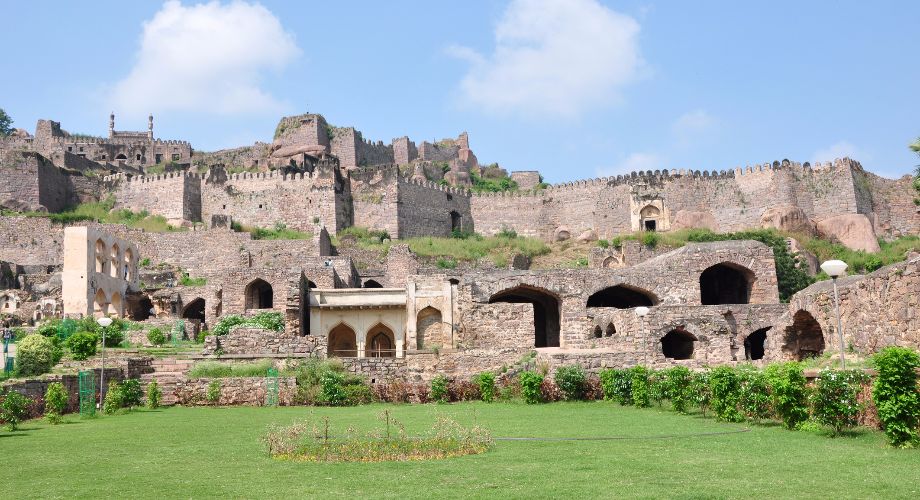 The ruins of Golconda Fort in Hyderbad against a partly cloudy sky