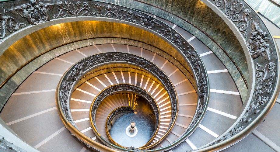 Aerial view down winding spiral staircase in the Sistine Chapel, Rome