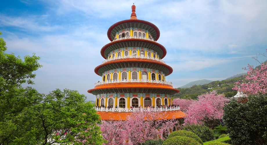 Taipei’s Wuji Tianyuan Temple with cherry blossom in the forefront 
