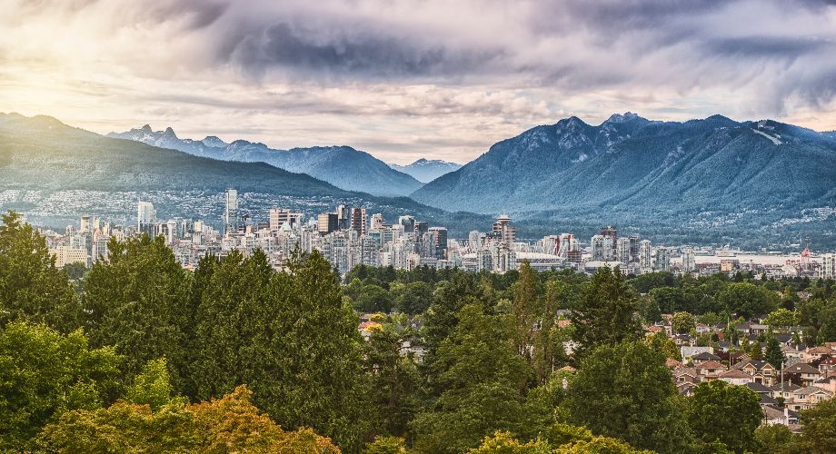 Vancouver city with mountains in background and forest in the foreground 