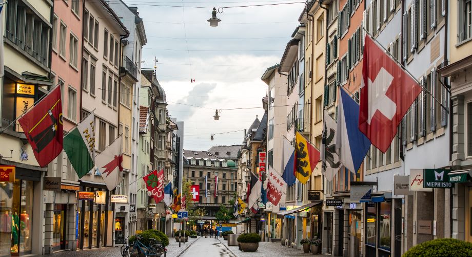 Shops and flags on Bahnhofstrasse, Zurich’s main street