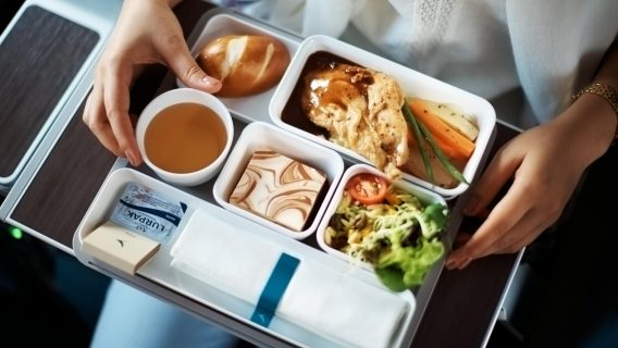 Designers made travel pouches with Cathay uniform features from our old uniforms