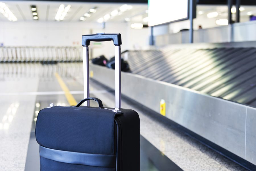 Electronic luggage tag lets travelers check-in bags from home