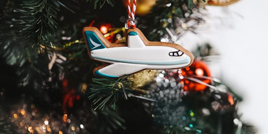Promotional image for Cathay Pacific’s Christmas Sale, featuring up to 10% off flights.