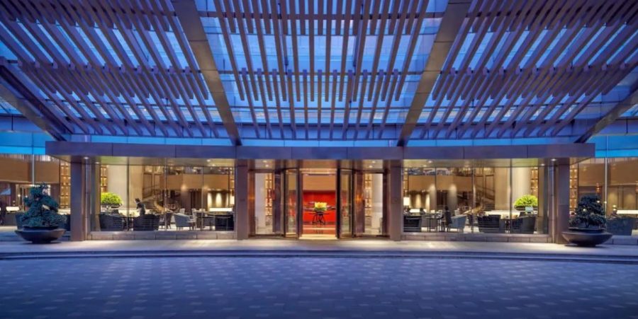 Exterior view showcasing its contemporary design and landscaped surroundings.