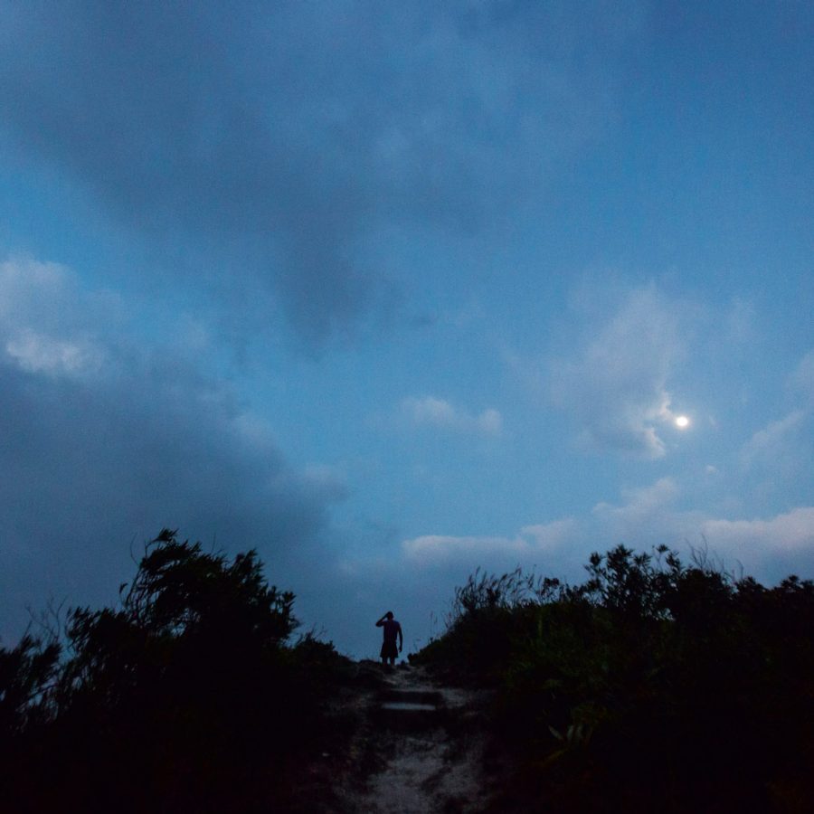 Trail runners go up High West, Hong Kong
