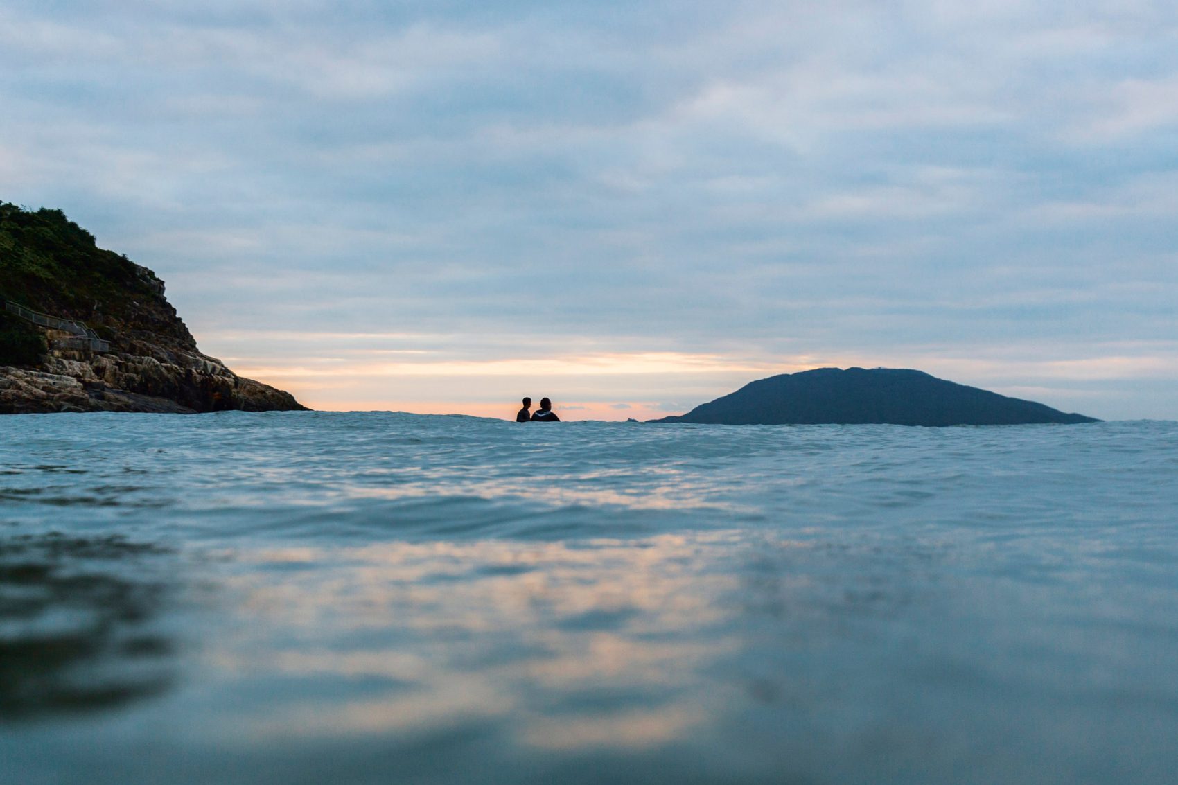 Surfing at Big Wave Bay in Hong Kong. Credit: Mike Pickles