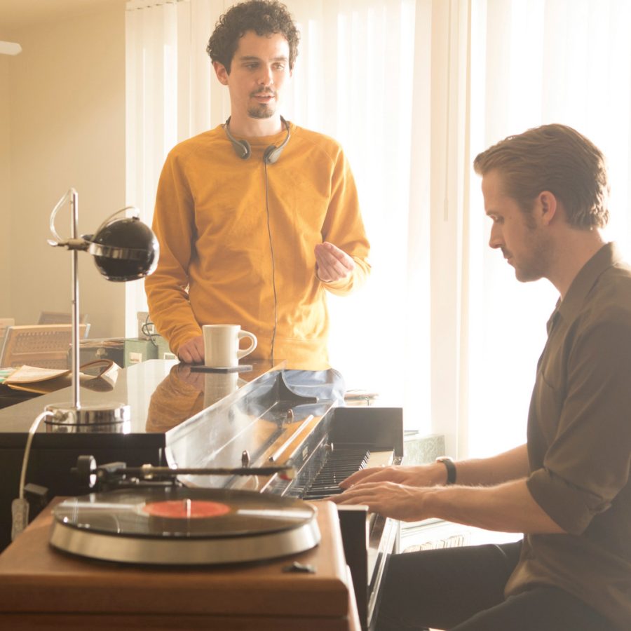 Song and dance man: Damien Chazelle (left), directing Ryan Gosling (right) on the set of La La Land. Credit: Dale Robinette