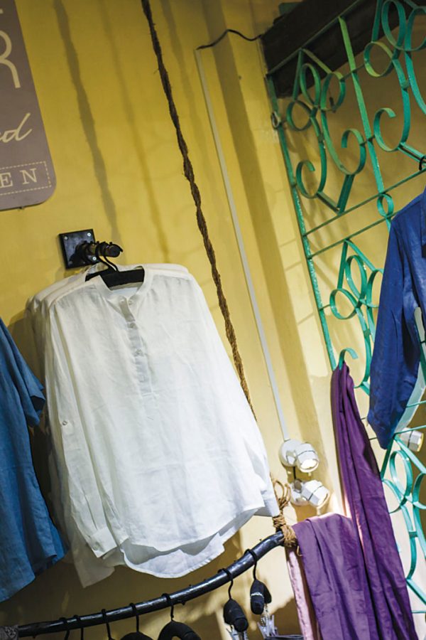Clothes hanging in store. Credit: Etienne Bossot