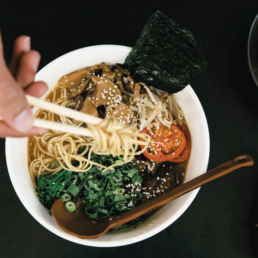 Ramen noodles topped with vegetables