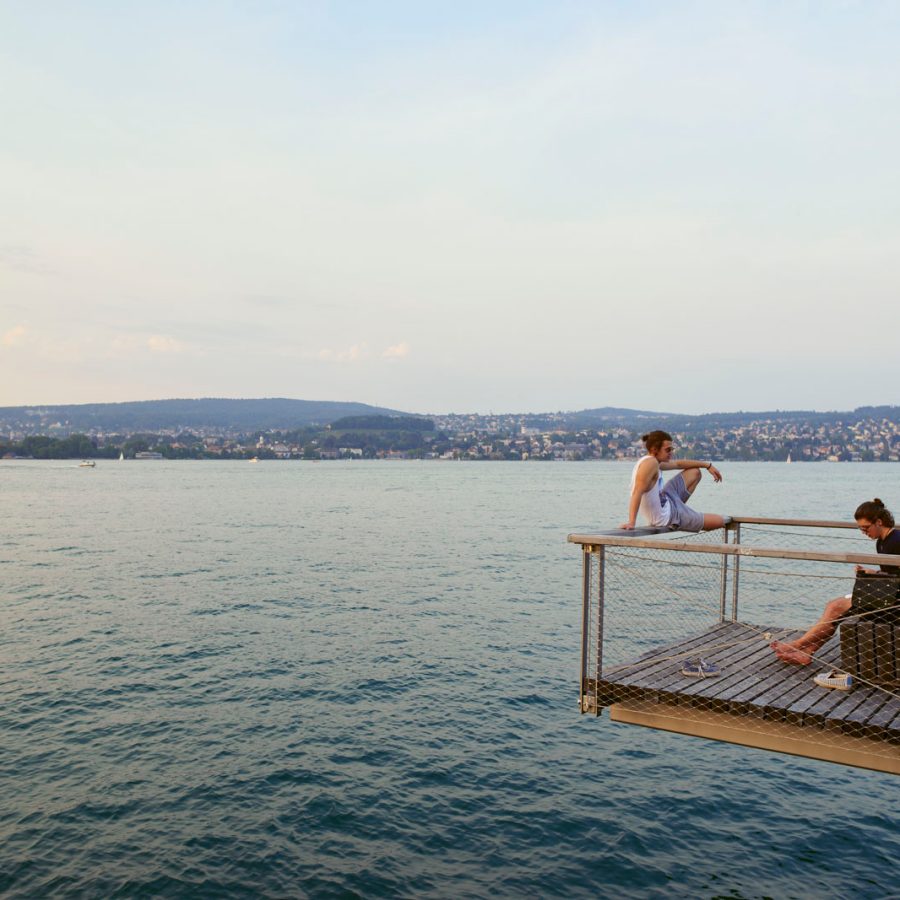 Swimmers by the ocean