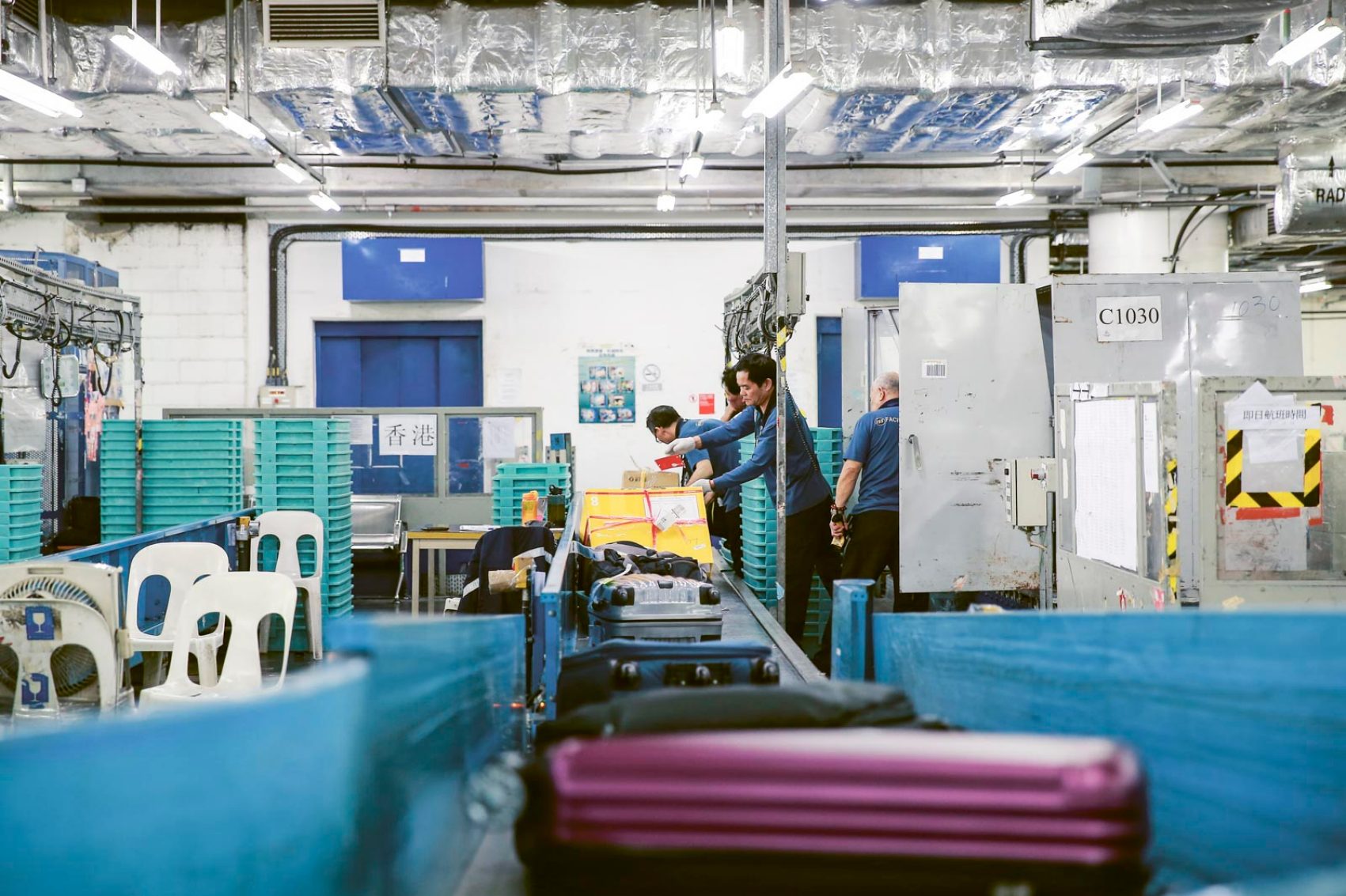 Cathay Pacific's Baggage Team. Credit: Karan Yung