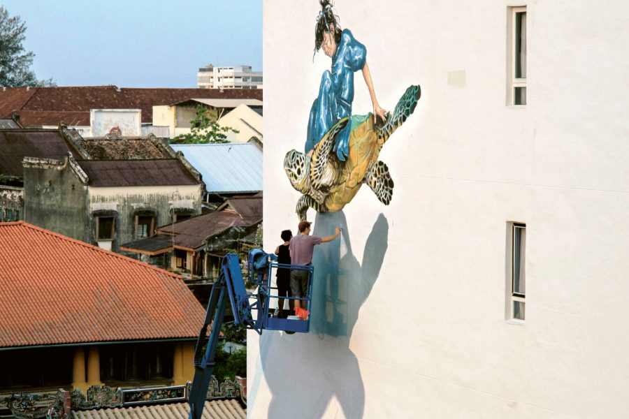 Painting of a girl riding on turtle. Credit: Henrik Haven