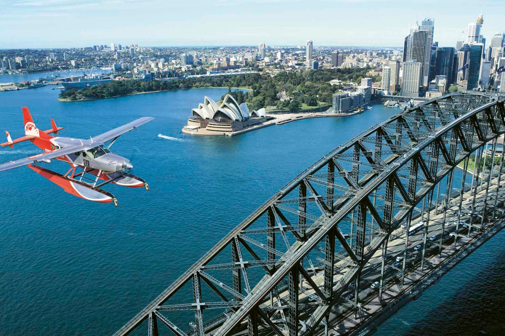 Sydney Seaplane flying over Sydney Harbour and Sydney Opera House