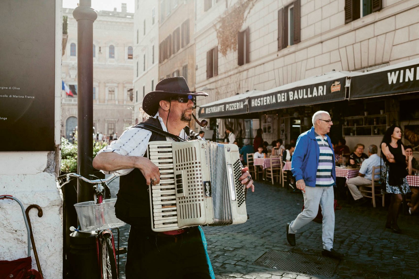 Man playing accordion in street. Credit: Ulrich Sperl