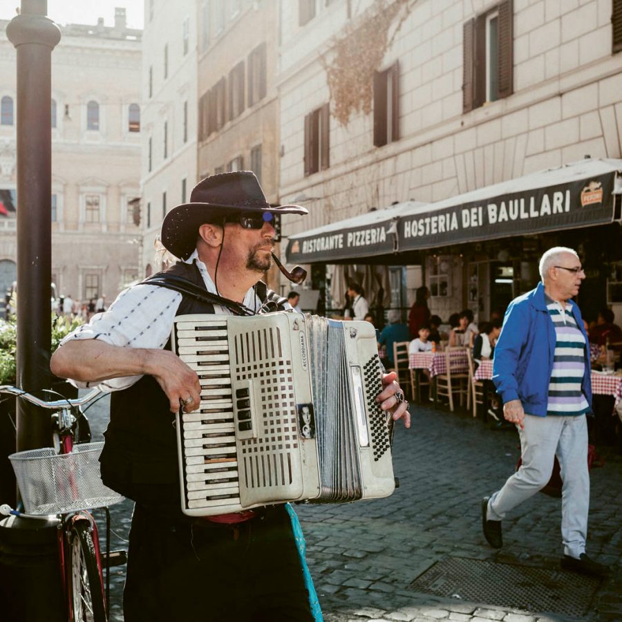 Man playing accordion in street. Credit: Ulrich Sperl