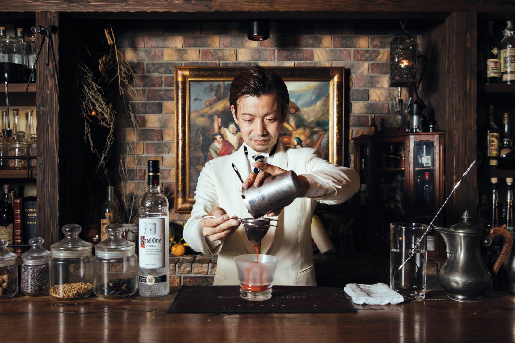 A bartender making medicinal liquor in Tokyo. Credit: Andrew Faulk