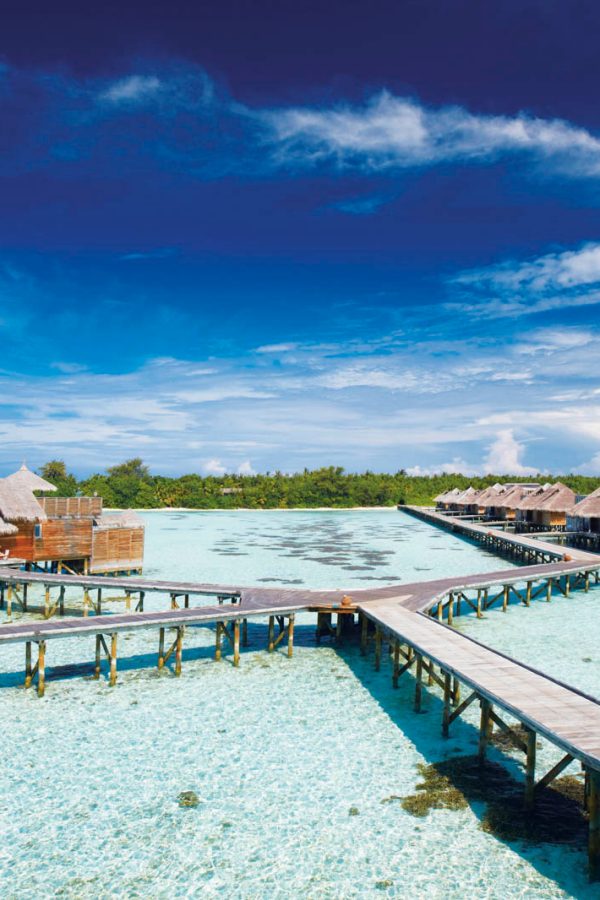 Villas over clear blue waters