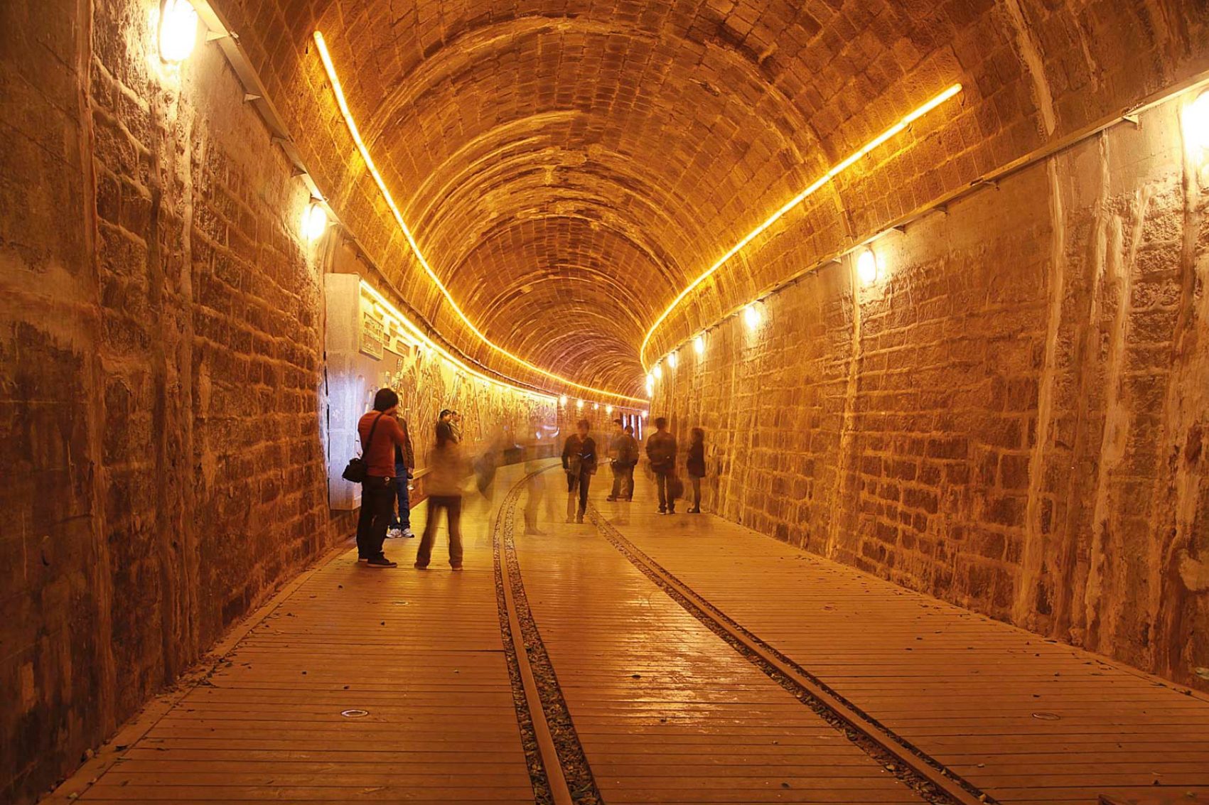 Underground tunnel with yellow lighting