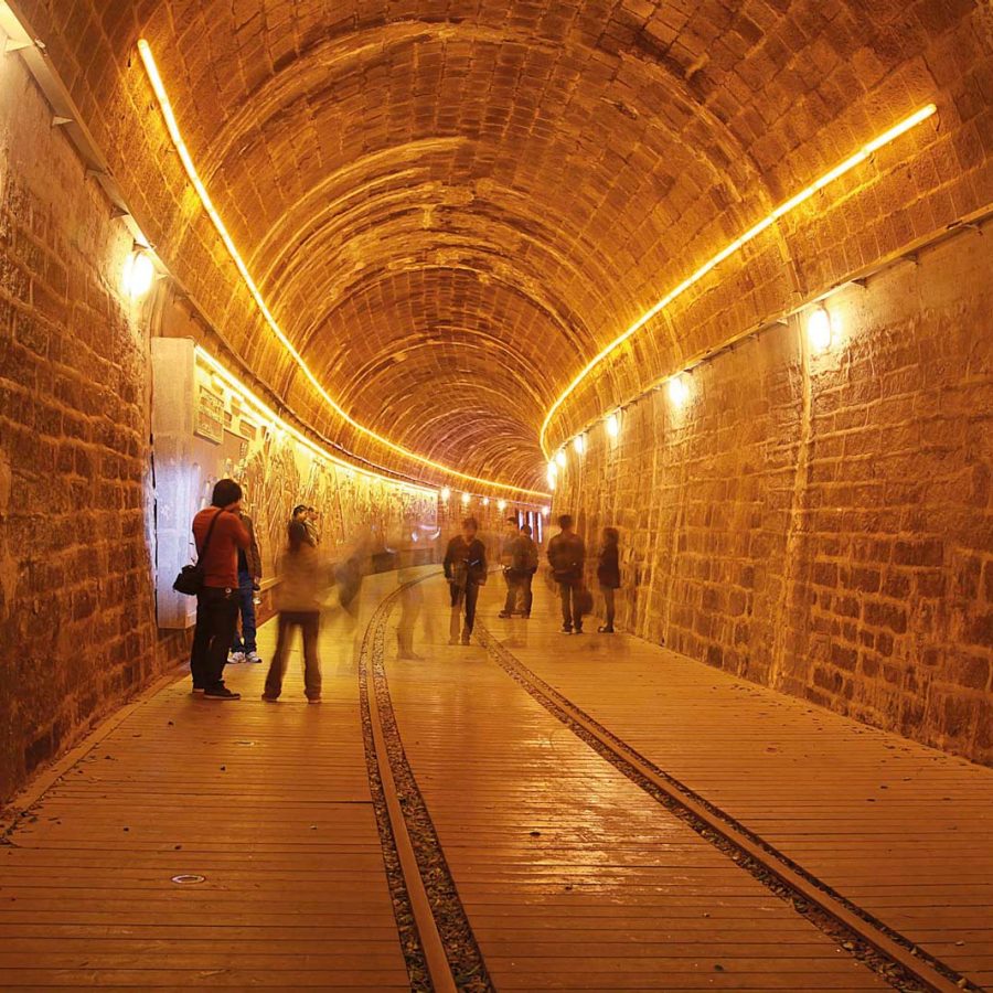 Underground tunnel with yellow lighting