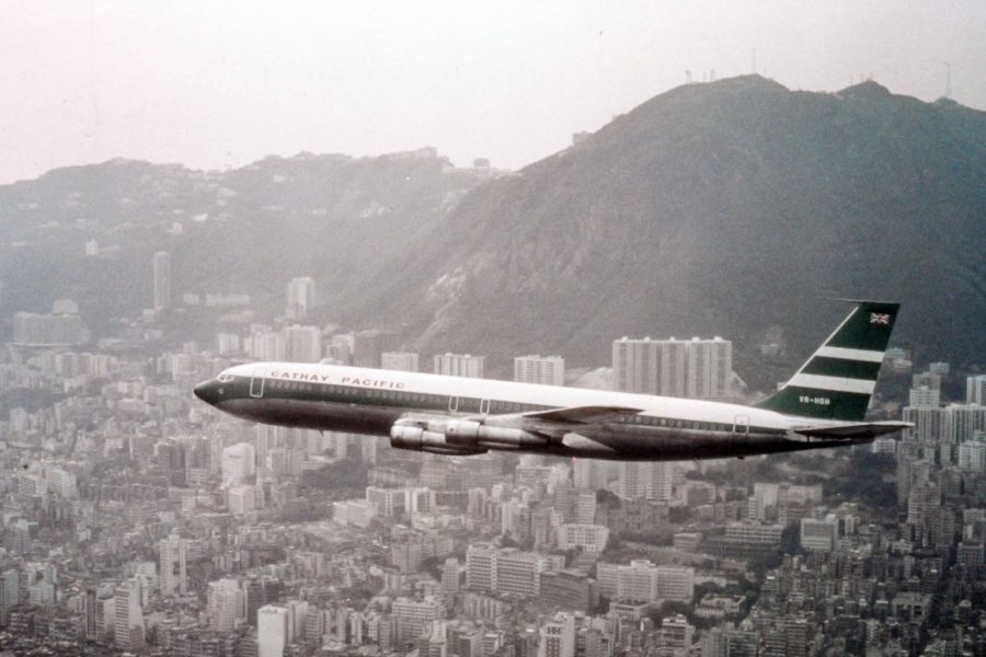 A Boeing 707 aircraft in the air in the late 60s
