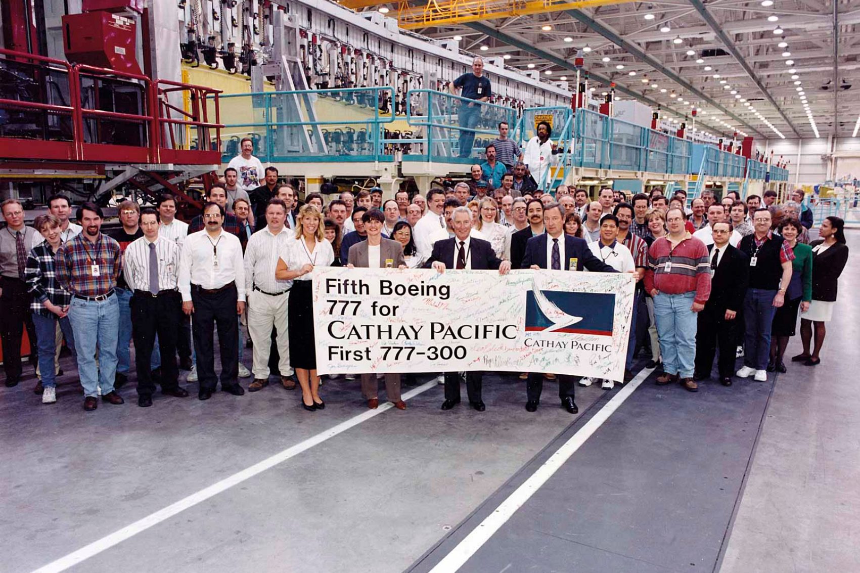 Crew celebrating the first Cathay Pacific 777-300 aircraft builds