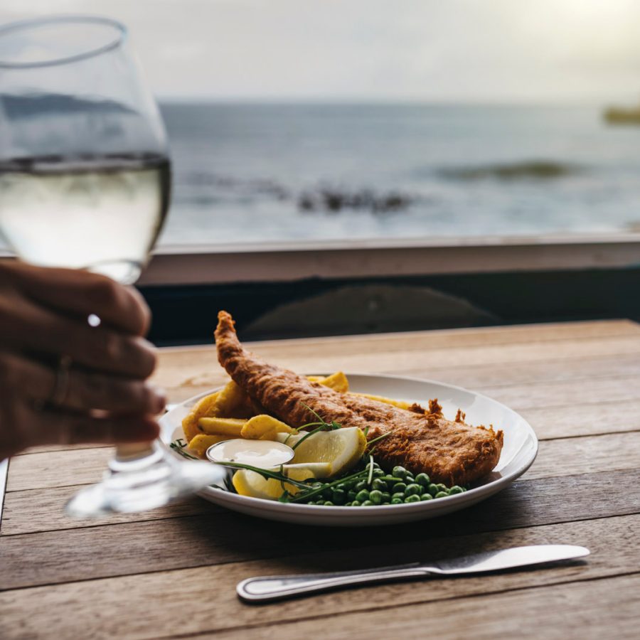Fish and chips over a beautiful ocean scenery