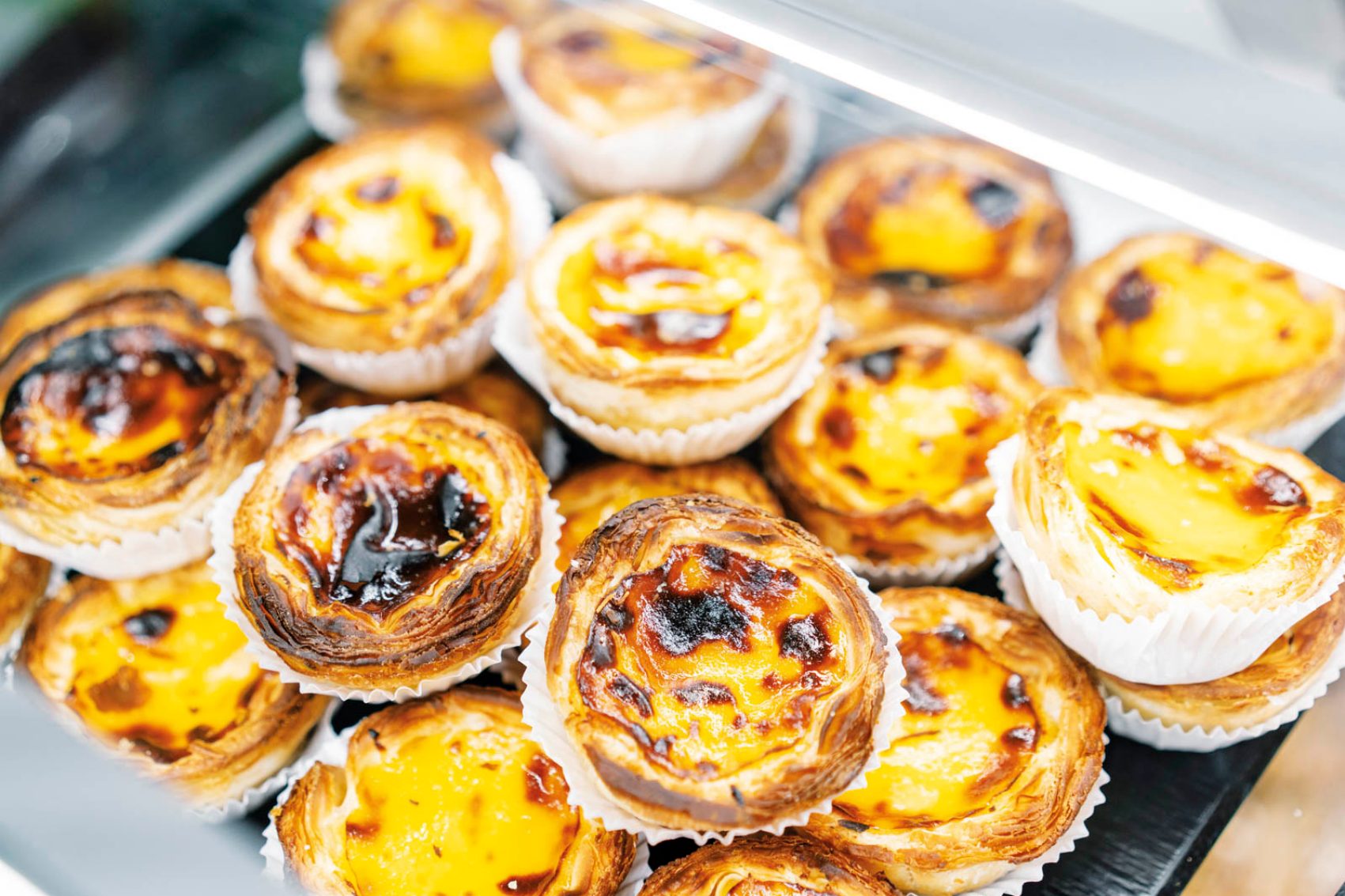 A tray of Portugese egg tarts from Macau, China (Greater Bay Area)