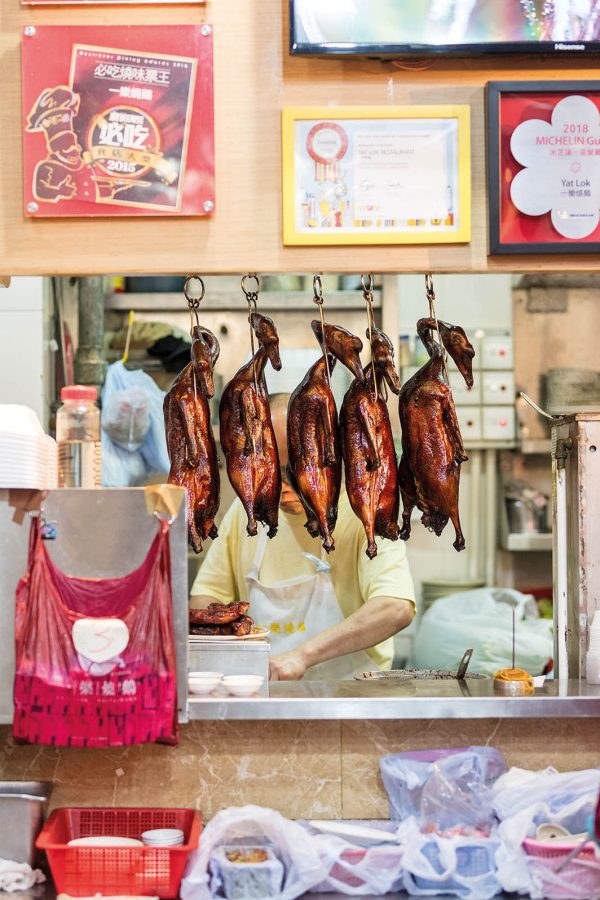 Ducks hanging in a shop window in Hong Kong