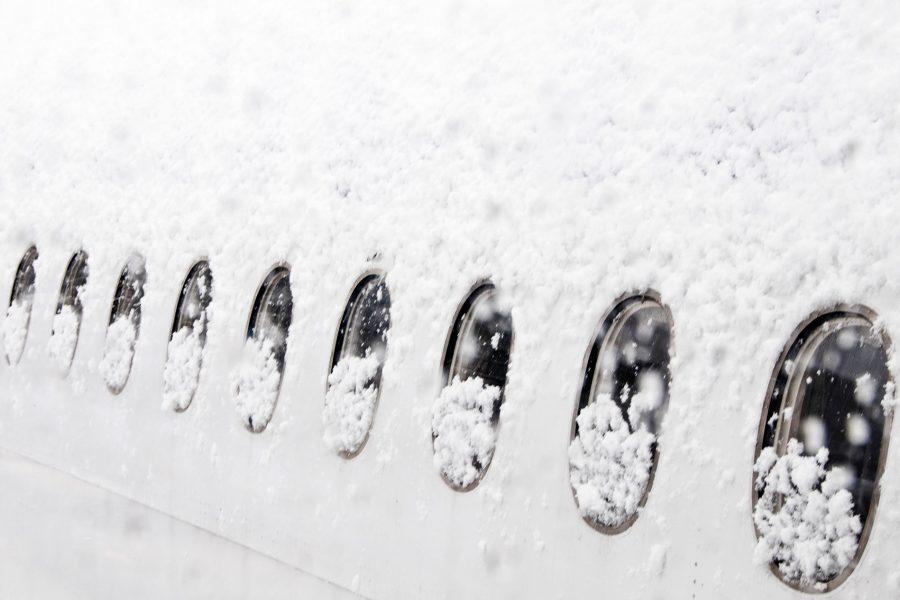 Close-up of thick snow falling on aeroplane standing at Gatwick Airport. Credit: Colin Walton / Alamy Stock Photo / Argusphoto