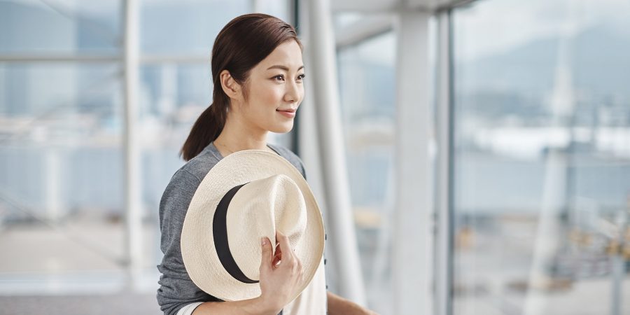 A lady waiting for boarding