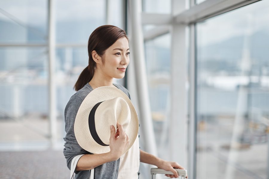 A lady waiting for boarding