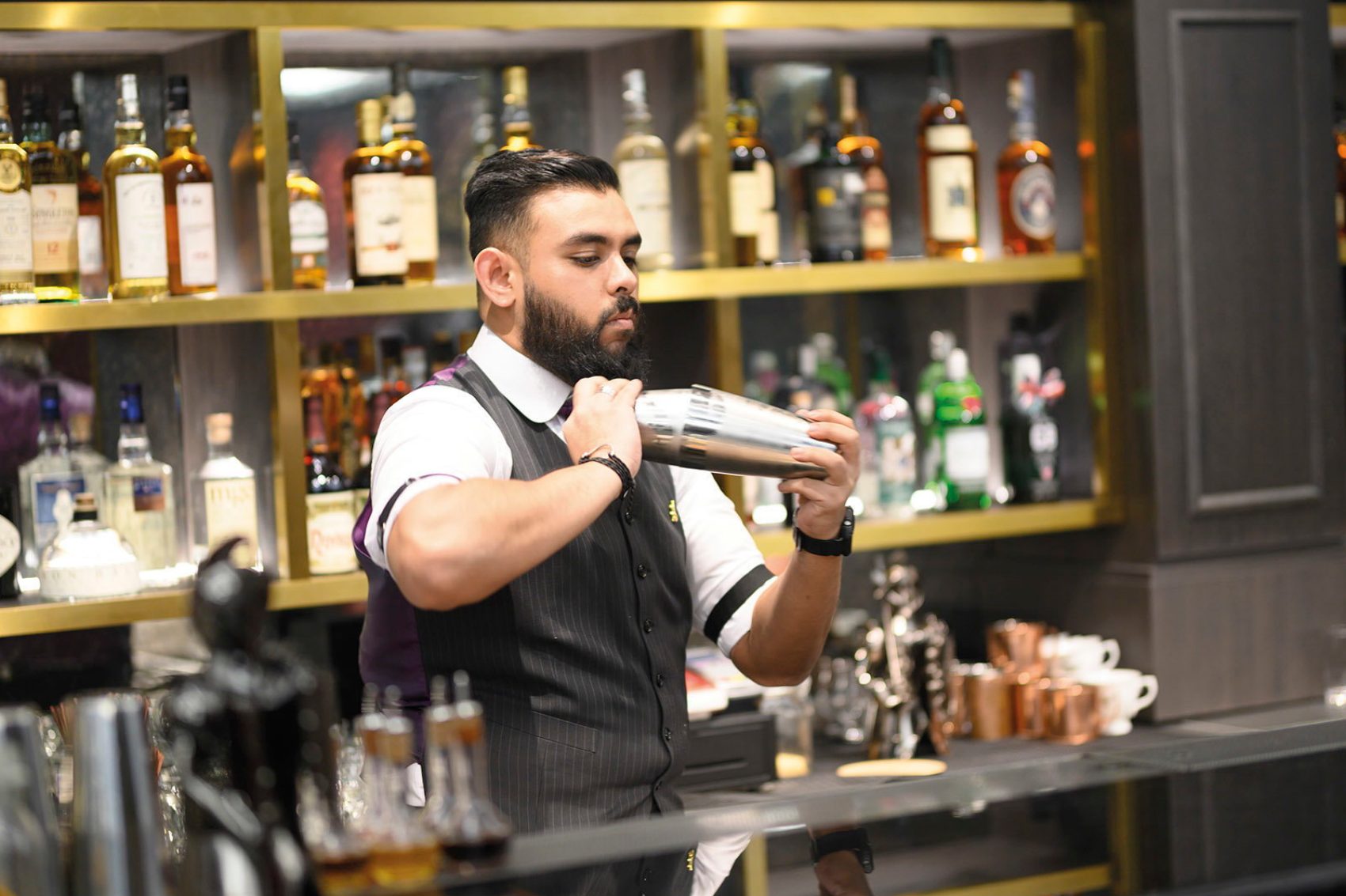A bartender at The Monarchy Credit: The Monarchy