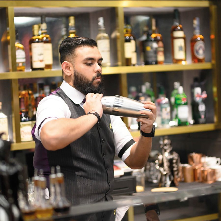 A bartender at The Monarchy Credit: The Monarchy