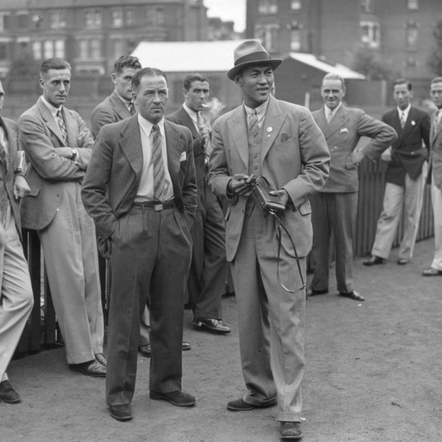 Lee Wai-tong and Arsenal captain Alex James. 
