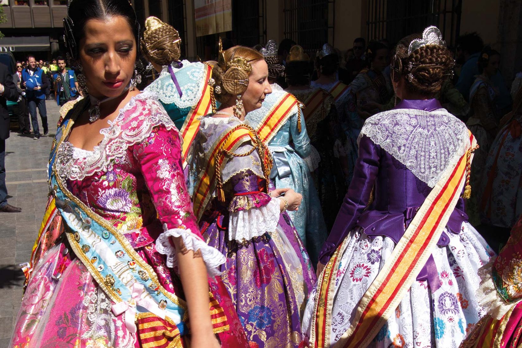 Ladies in bright cultural dresses 