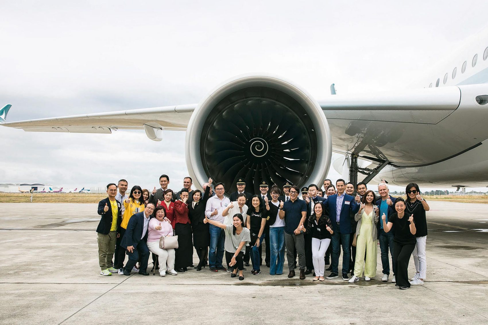 Cathay members on the tarmac for the delivery of a new Cathay A350-900
