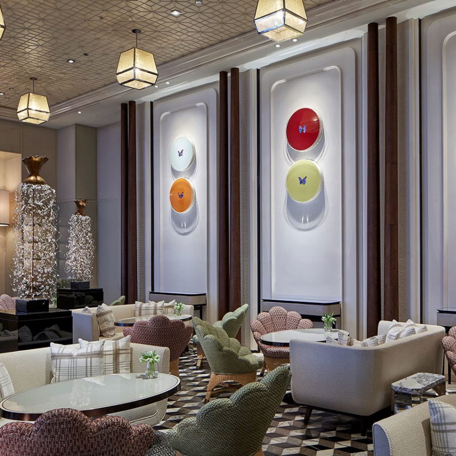 the Rosewood Hong Kong’s Butterfly Room, a cheerful, modern lounge decorated with Damien Hirst butterfly artwork