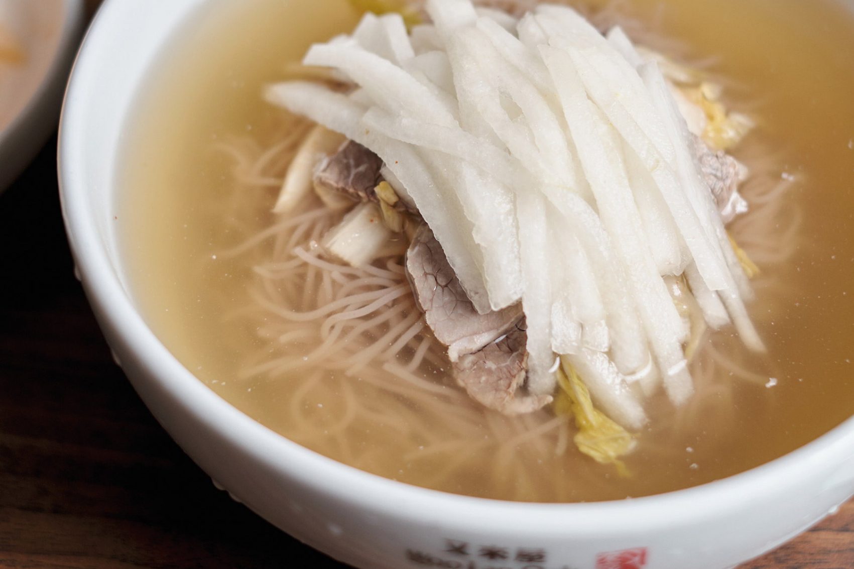 A bowl of cold buckwheat noodles at Woo Lae Oak restaurant, Seoul, Korea