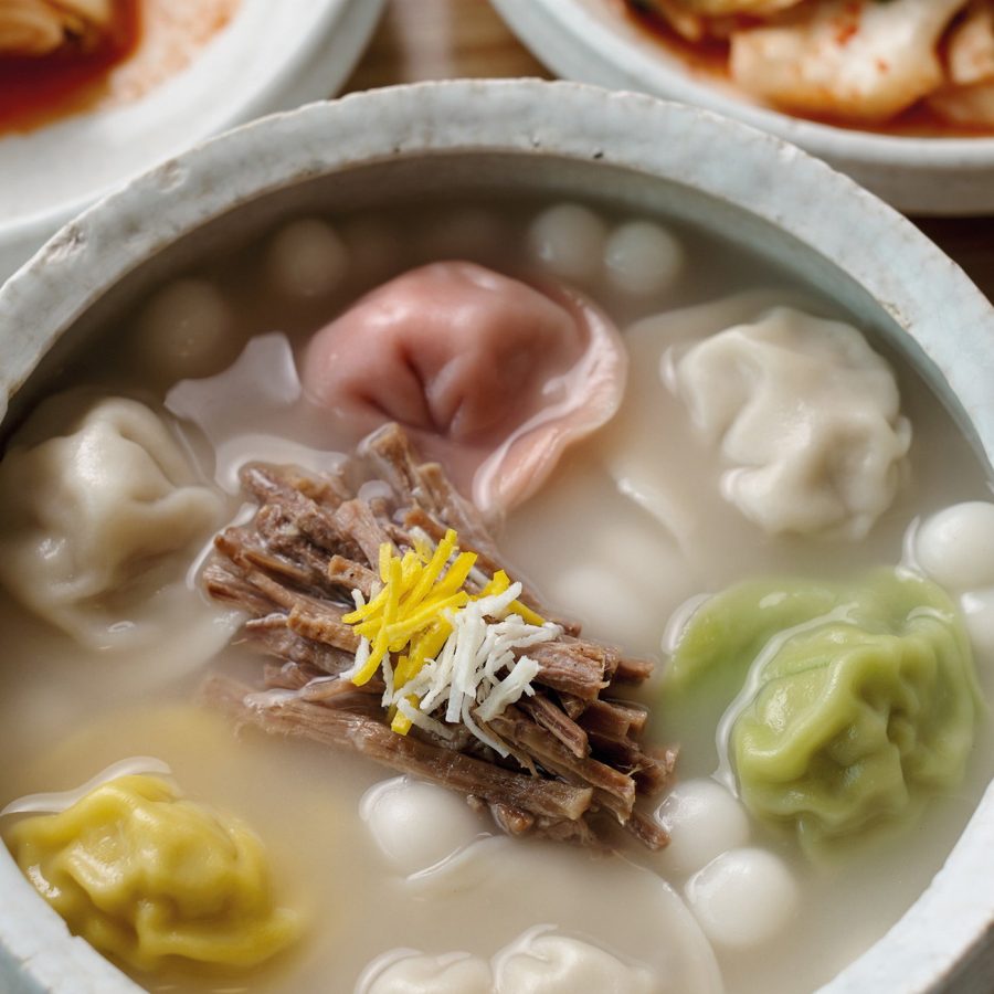 A bowl of naturally dyed dumplings in a light meat broth. Credit: Dylan Goldby  Jaha Mandu, Seoul, Korea