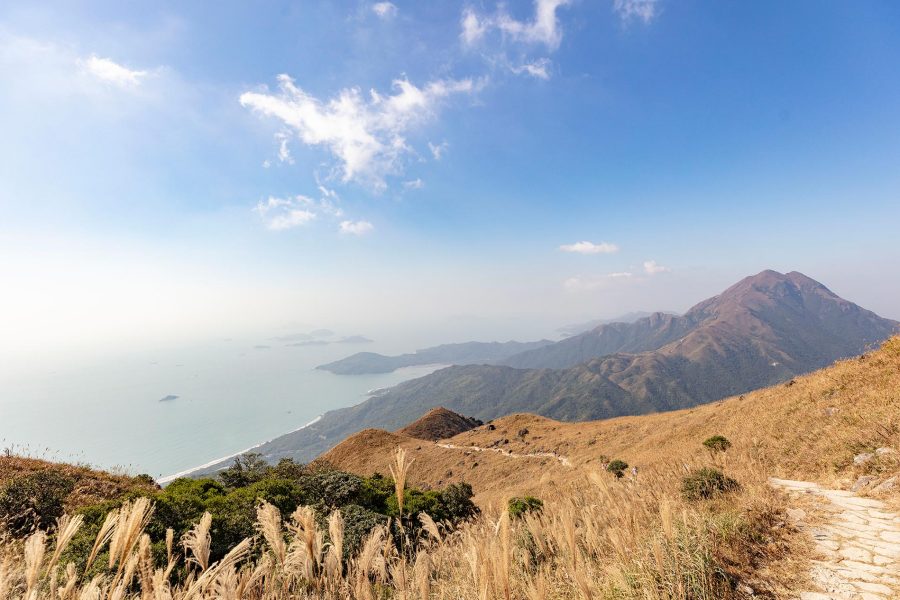 A landscape view of green hills and sea in Lantau Island, Hong Kong