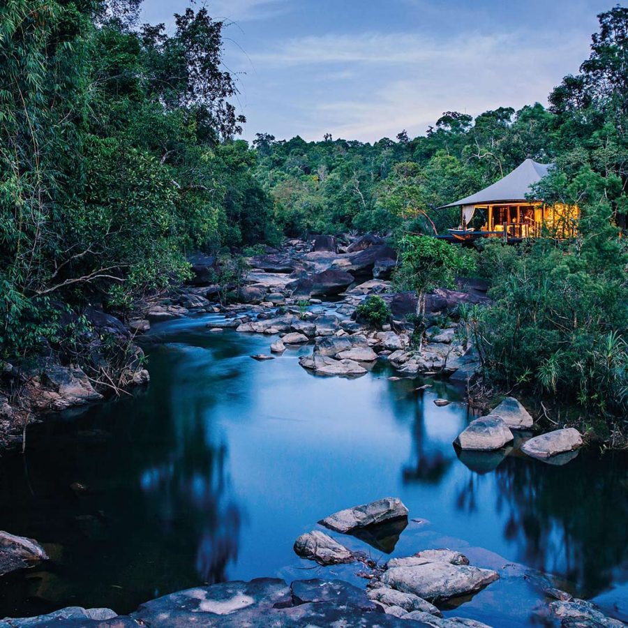 Blue river surrounded by greenery