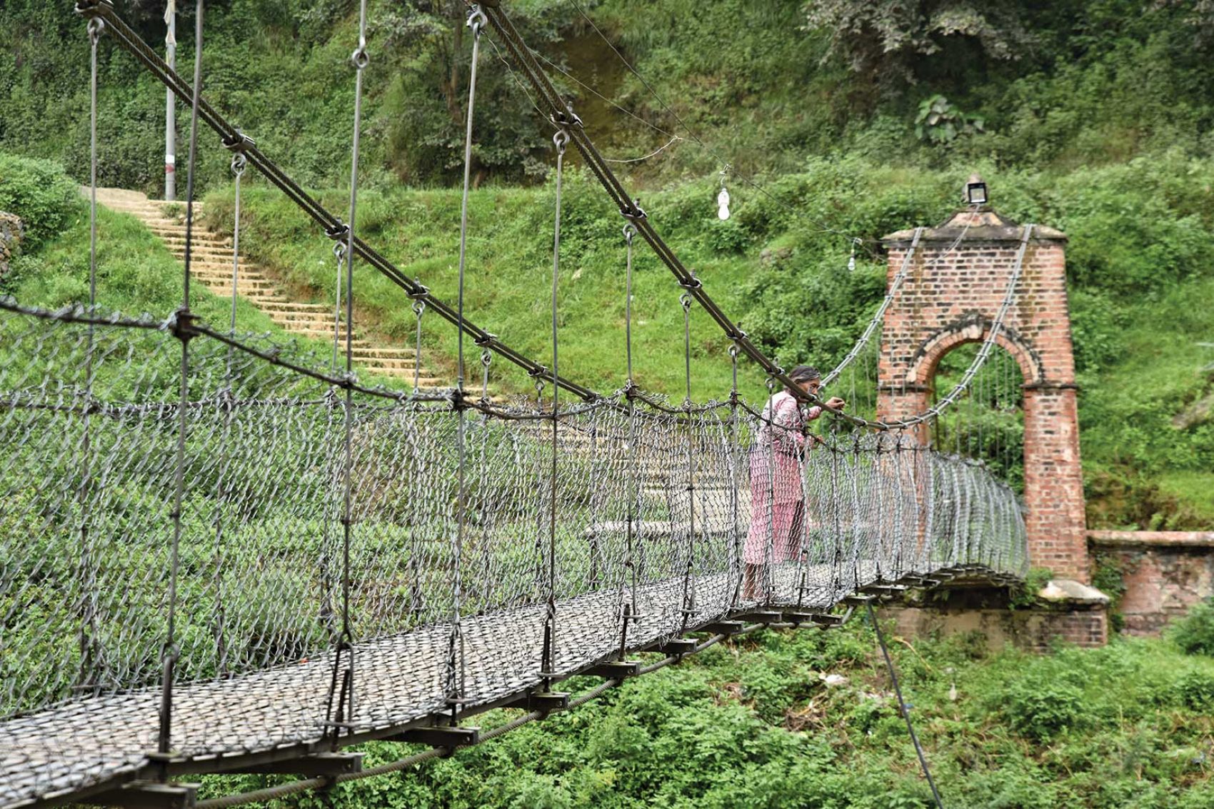 Man on a bridge