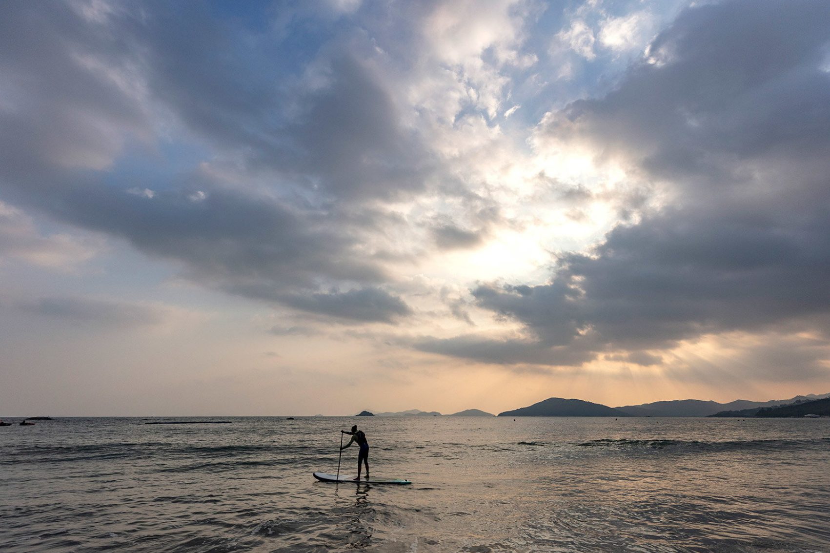 A standup paddleboarder by Cheung Sha beach. Credit: Mike Pickles