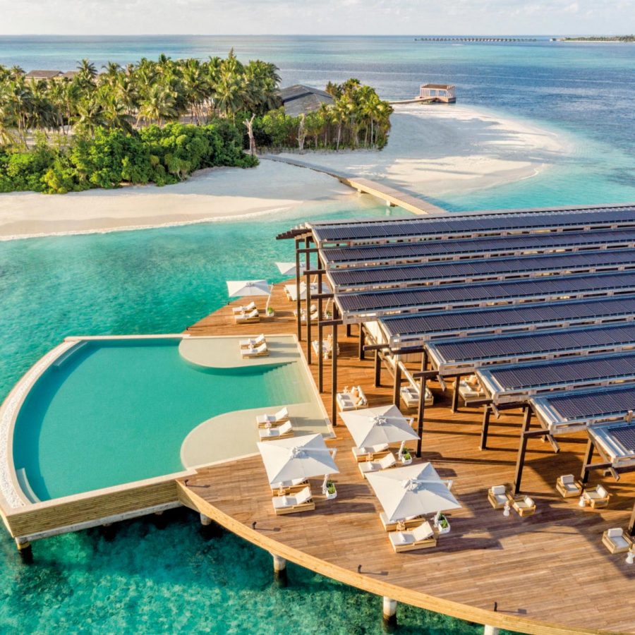 Hotel with pool surrounded by the ocean