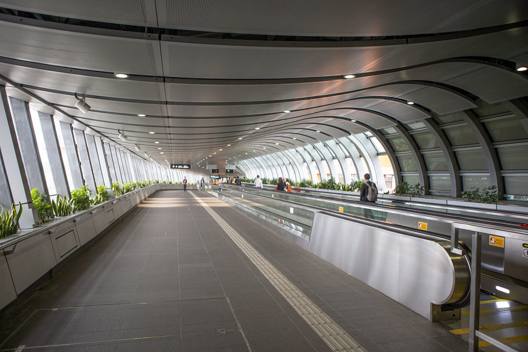 The open-air footbridge which connects Hong Kong West Kowloon station to the Elements shopping mall