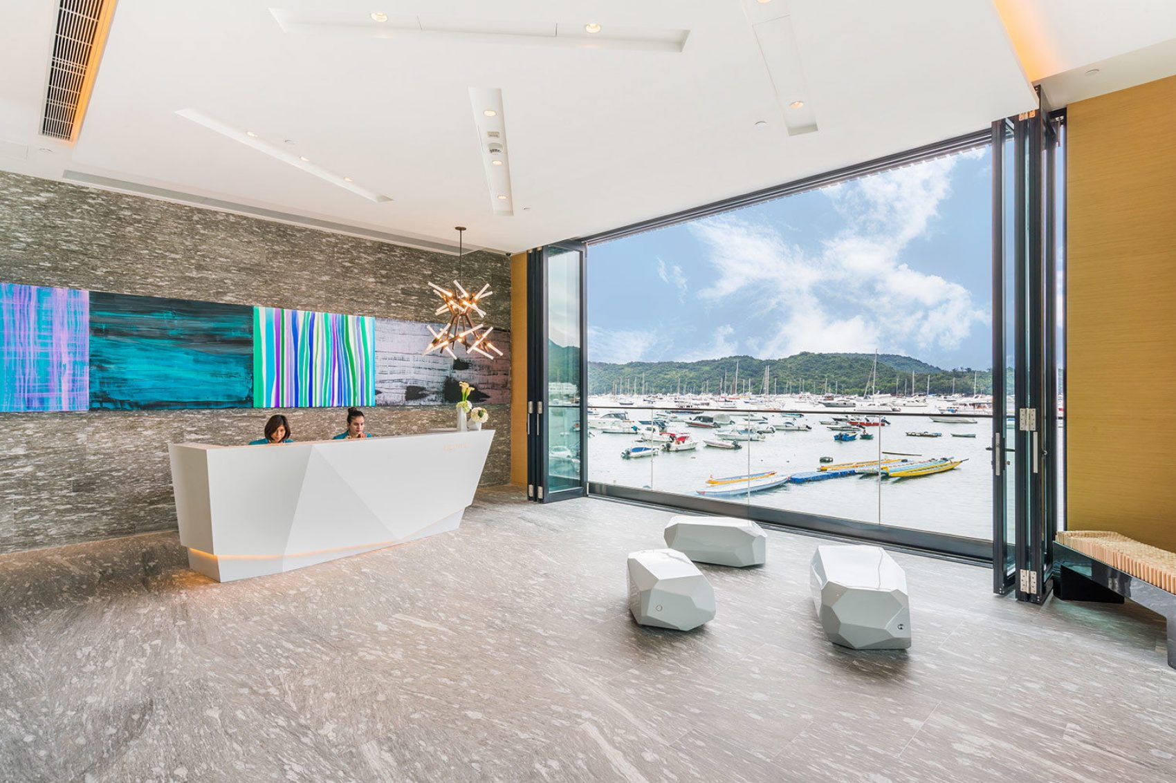 Lobby interior of The Pier Hotel with a view of the Sai Kung harbour in New Territories