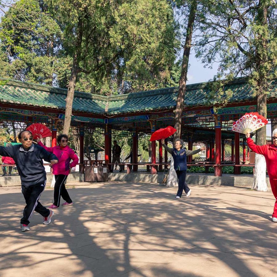 Group of people practicing Tai Chi