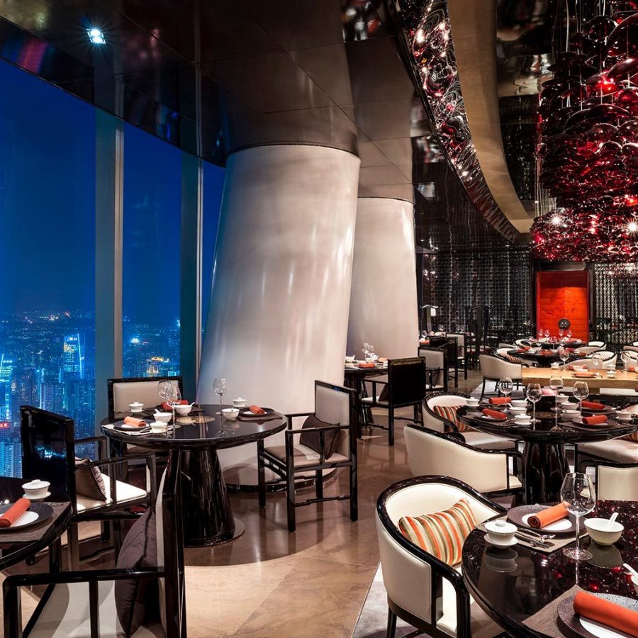 Interior of Four Seasons, Guangzhou, with skyline in background.